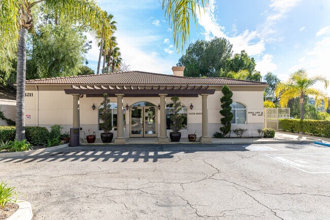 Club house and plenty of parking - 5220 Premiere Hls Dr