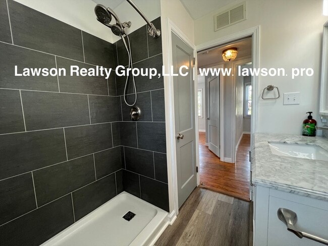 Building Photo - Updated, Cozy, and Clean- One Level Living...