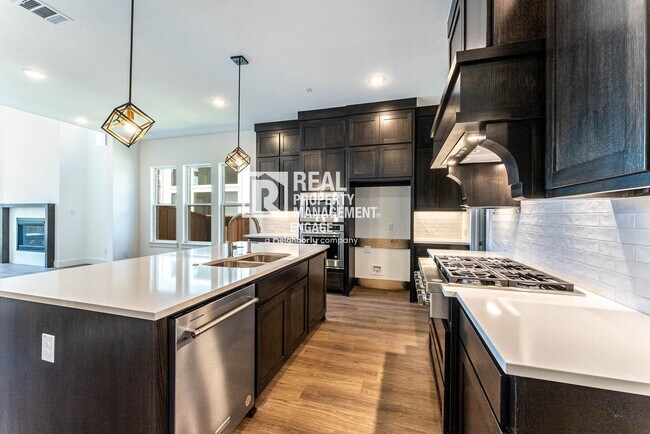 Building Photo - Highly Upgraded Five-Bedroom Home Located ...