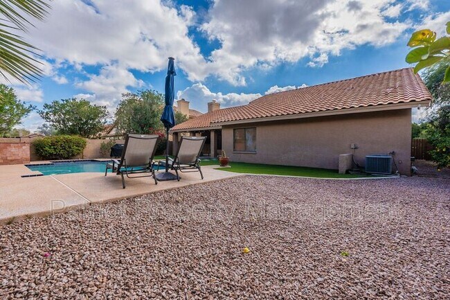 Building Photo - 9910 E Sutton Dr