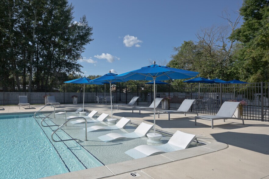 Pool - Sun Shelf Tanning Area - Enclave Apartments