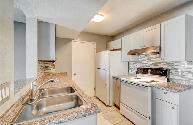 Building Photo - Two Bedroom Condo