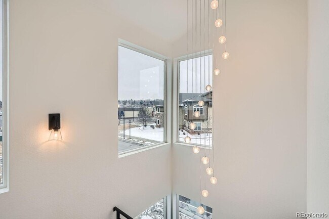 Building Photo - New Construction 3-Bedroom Townhome with Rooftop Deck & Mountain Views