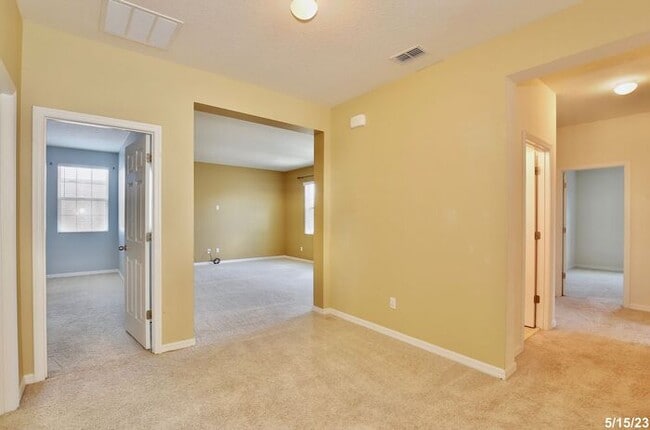 Building Photo - Gorgeous 4/3.5 Home with a Large Fenced Ba...