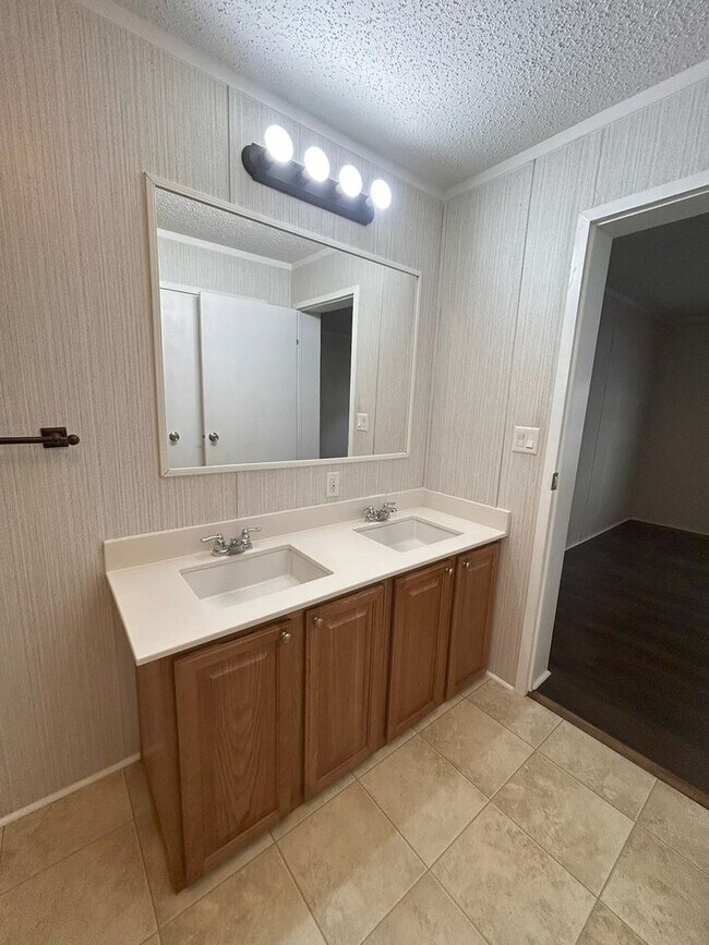 Building Photo - Immaculate 4BR Mobile Home in the heart of...
