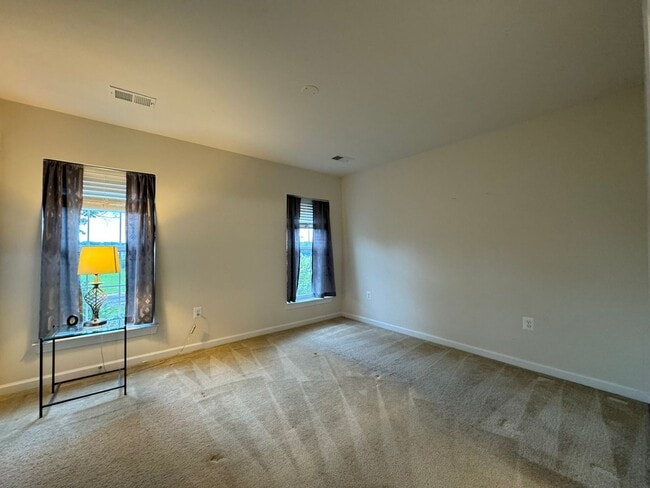 Building Photo - Stylish 3 Bed 3 Bath Townhome With Patio A...