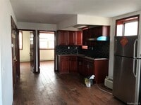 Building Photo - 57-30 Main St