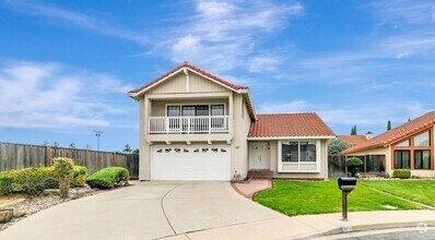 Building Photo - Spacious and Charming 4-Bedroom Home in Pr...