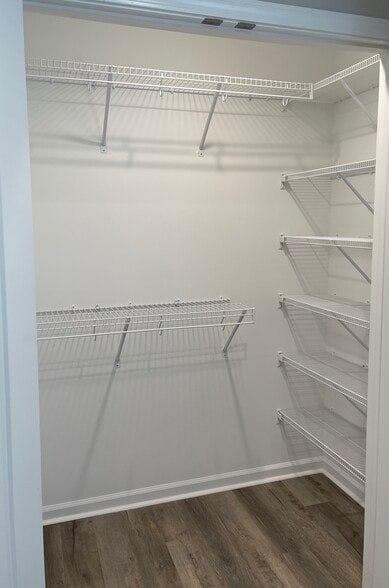 Second bedroom closet, plenty of shelving - 2225 Kenwood Blvd SE