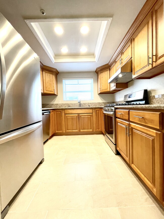 Remodeled Kitchen with Stainless Steel refrigerator - 7223 Lotus Ave