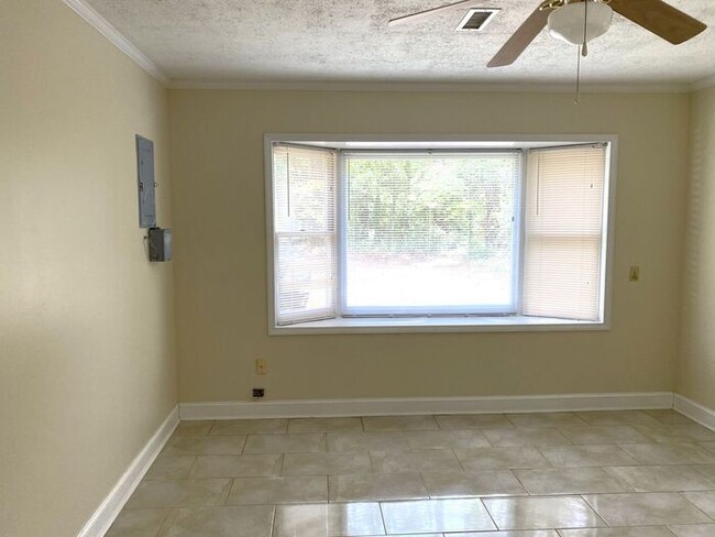 Building Photo - 4BR brick home with rocking chair porch, f...