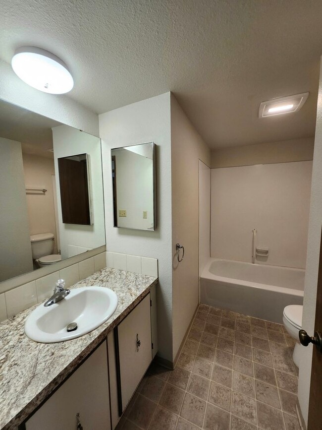 Building Photo - Spacious One Level 4 Bedroom, All New Kitchen Appliances, Landscaping Included!