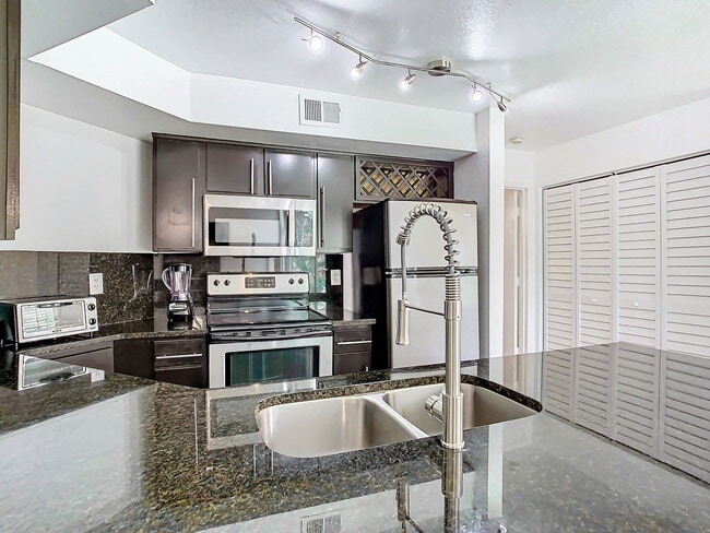 Building Photo - Westpointe Boulevard, Orlando, FL 32835 - 1 BR 1 BA condo