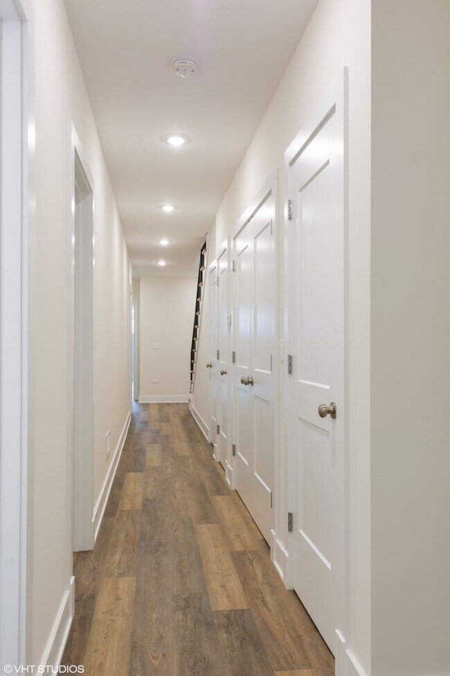 Building Photo - Condo Quality 3,400 SF Duplex Down in Roscoe Village, Pet Friendly Available August 1st