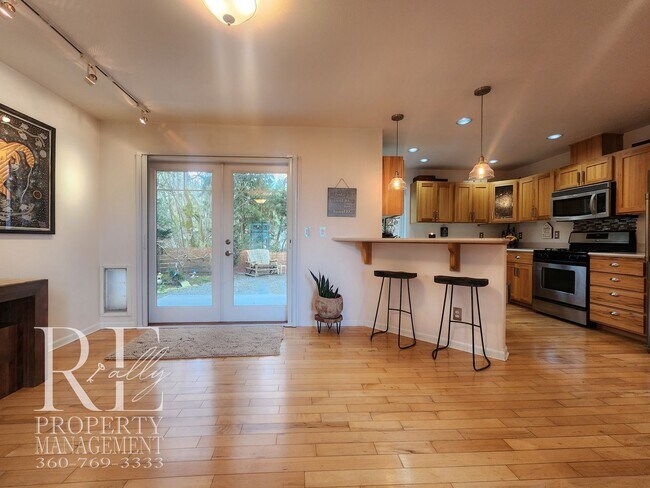 Building Photo - Light-Filled View Home with Vaulted Ceilings & Warm Wood Finishes