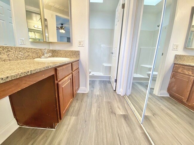 Building Photo - CONDOMINIUM IN A GATED COMMUNITY WITH 2 BE...