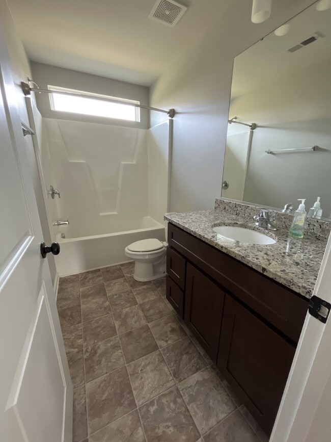 Building Photo - "Charming 4-Bed High Point Home with Granite Elegance & Cozy Fireplace!"