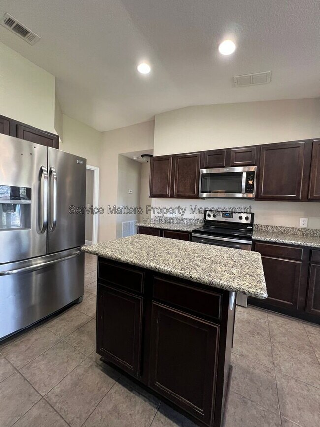 Building Photo - 7045 Harvest Way
