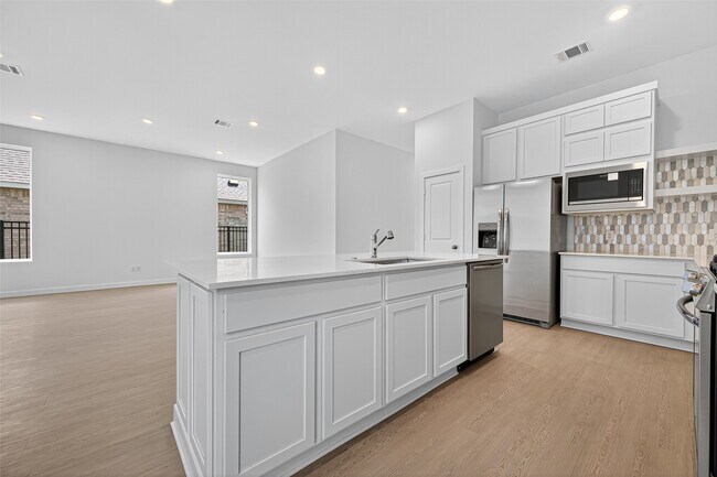 Building Photo - 27423 Sunterra Village Dr