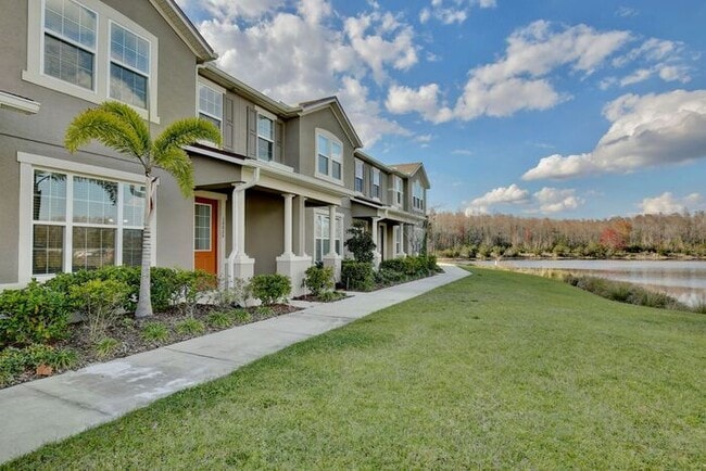 Building Photo - Luxurious 3/2.5 Modern Townhome with a Private Balcony and a 2 Car Garage in the Exclusive Gated ...