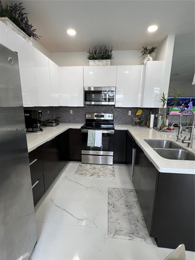 Building Photo - 9336 W 34th Ct