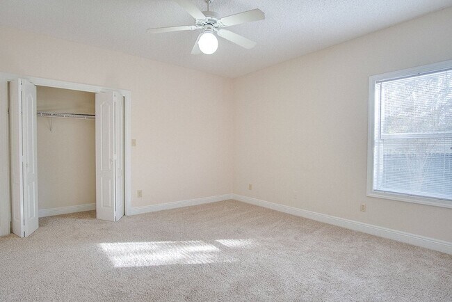 Building Photo - Festive Move-In Special! 4BR/3BA Lenox Gem – Fully Fenced Backyard & Military ½ Deposit