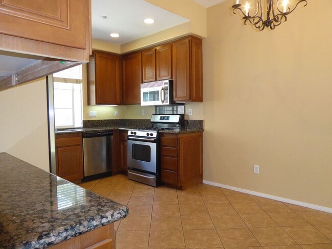 Building Photo - Conveniently located 3 BR, 3 Bath townhome in Coronado Ranch, close to everything.