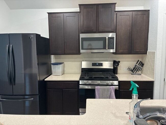 Building Photo - COMING SOON! Beautiful 4BR 3BA w/ Fenced Backyard • Private Yard• Attached Garage in Siena