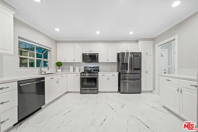 Building Photo - 18334 Los Alimos St
