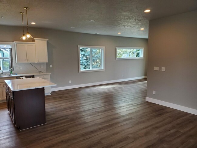 Building Photo - Craftsman 1 Story Zero Step House