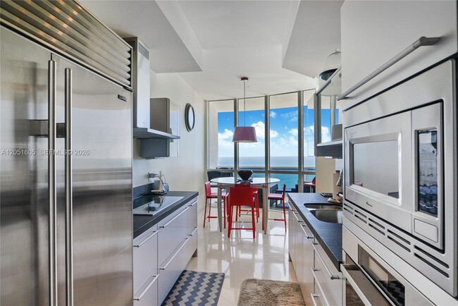 Building Photo - 18201 Collins Ave