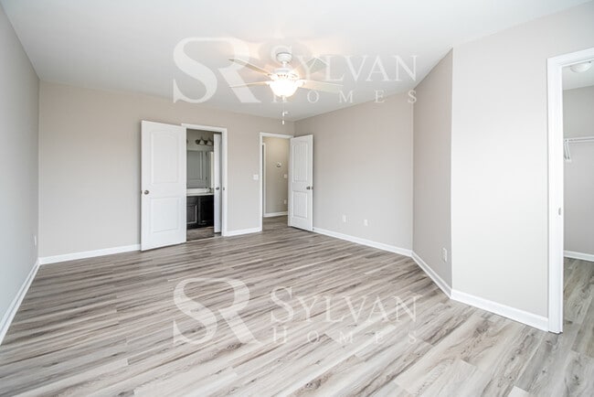 Building Photo - Feel welcome in this well-maintained 4BR 2...