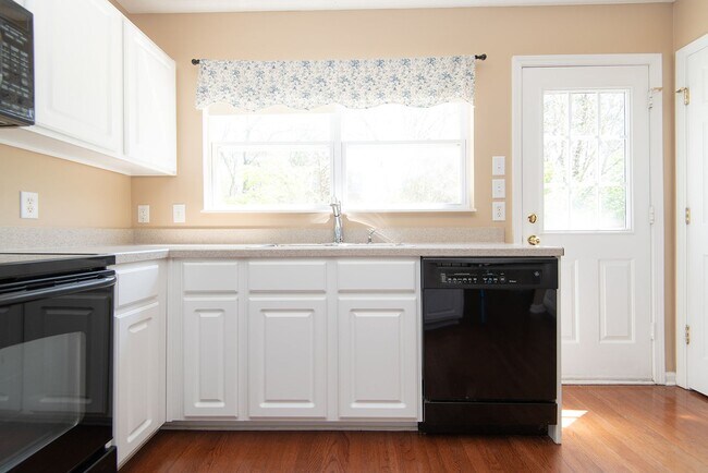 Building Photo - Former model home in highly sought after B...