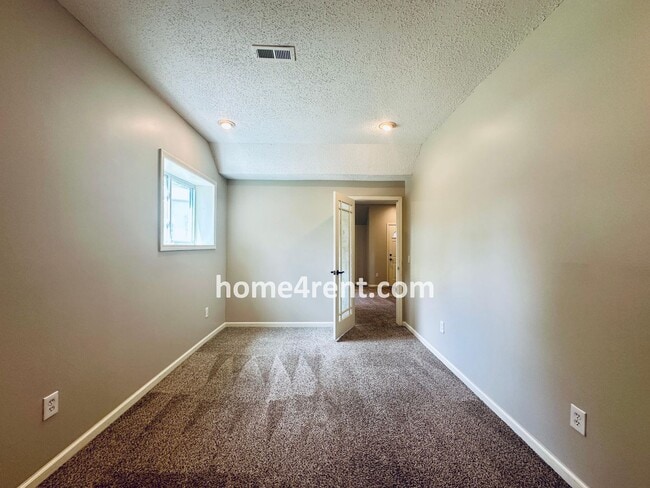 Building Photo - Brand New Paint, Wood Floors, Walkout Fini...