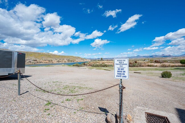 Building Photo - Waterfront 2BR 2B Condo Lower Level, gated with tennis,pool,spa,PRIVATE BEACH/DOCK