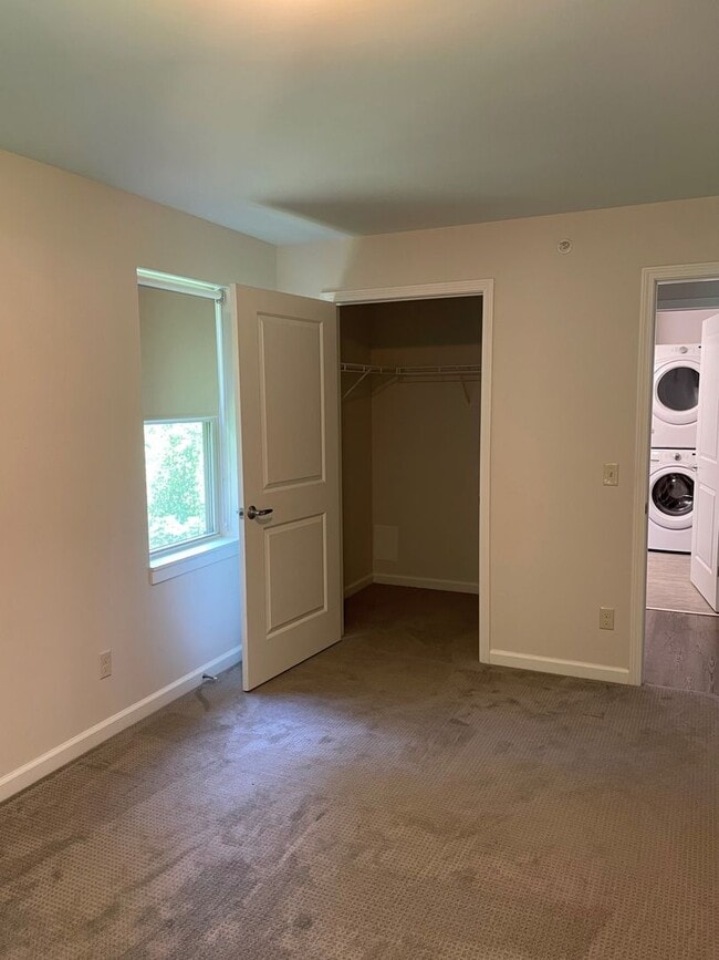 Building Photo - One Bedroom End Unit