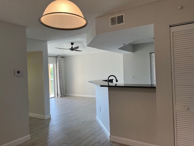Building Photo - GORGEOUS 1 BEDROOM WITH WATER VIEWS IN PORTOFINO AT JENSEN BEACH