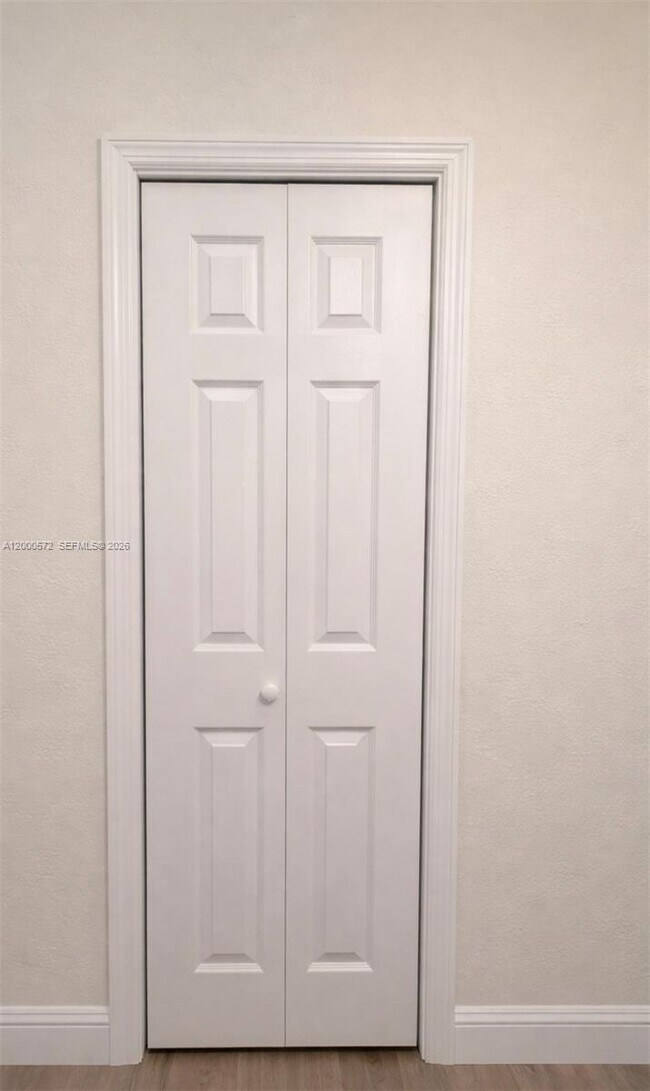 Building Photo - 6497 W 8th Ln