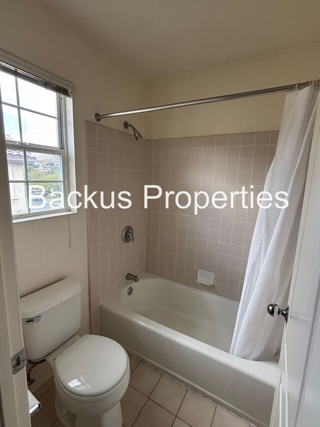 Building Photo - Great two-level home in Las Palmas II with scenic views