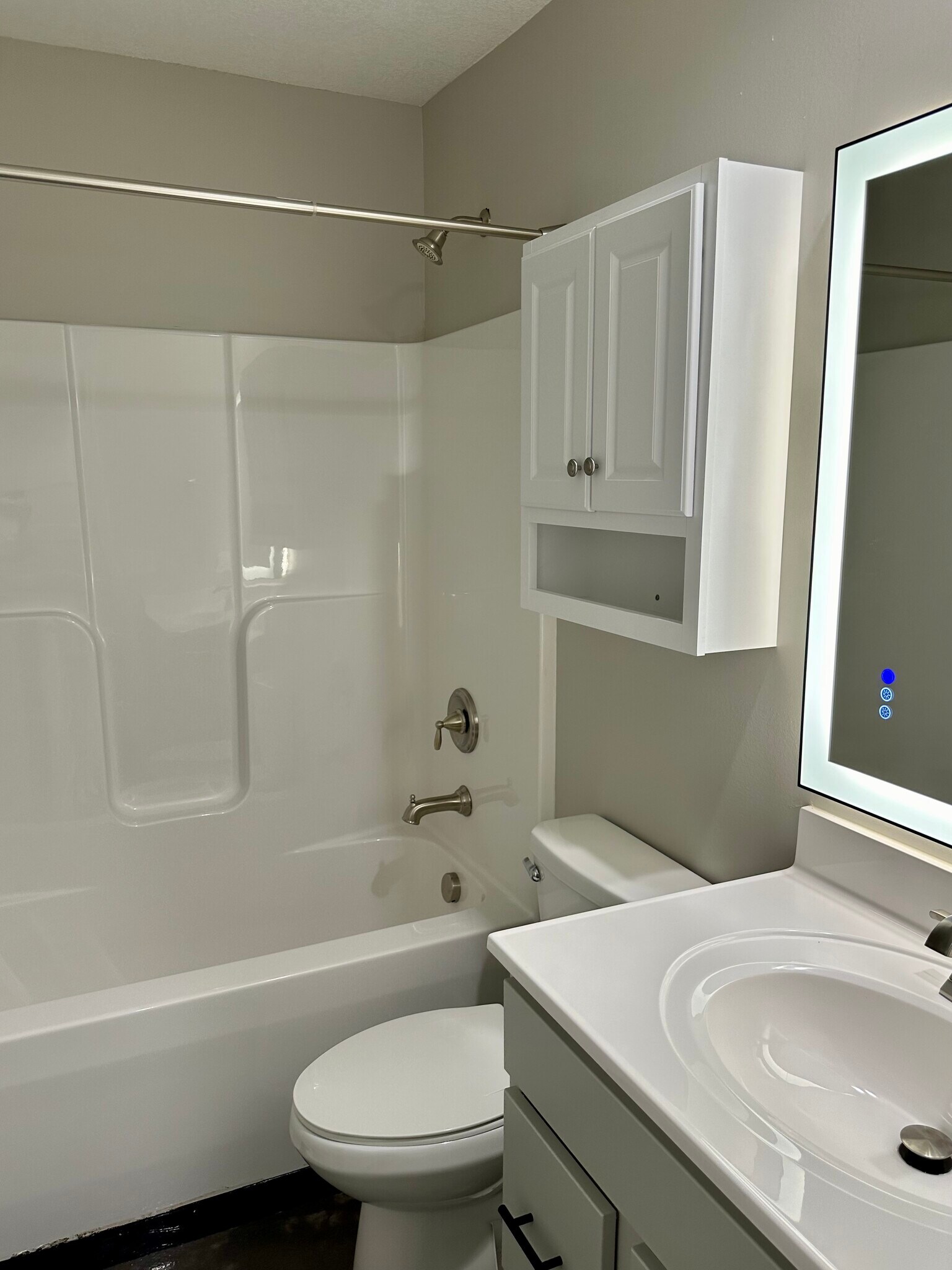 Counter height vanity, wall cabinet, tub/shower combo, soft close toilet seat - 2304 Belle Ave NE