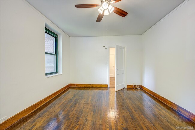 Building Photo - 34-40-40 79th St
