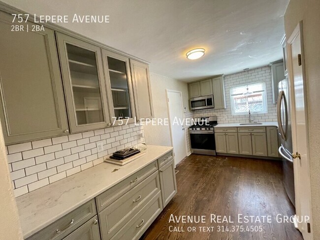 Building Photo - Charming 2-Bed, 2-Bath 1st-Floor Unit with...