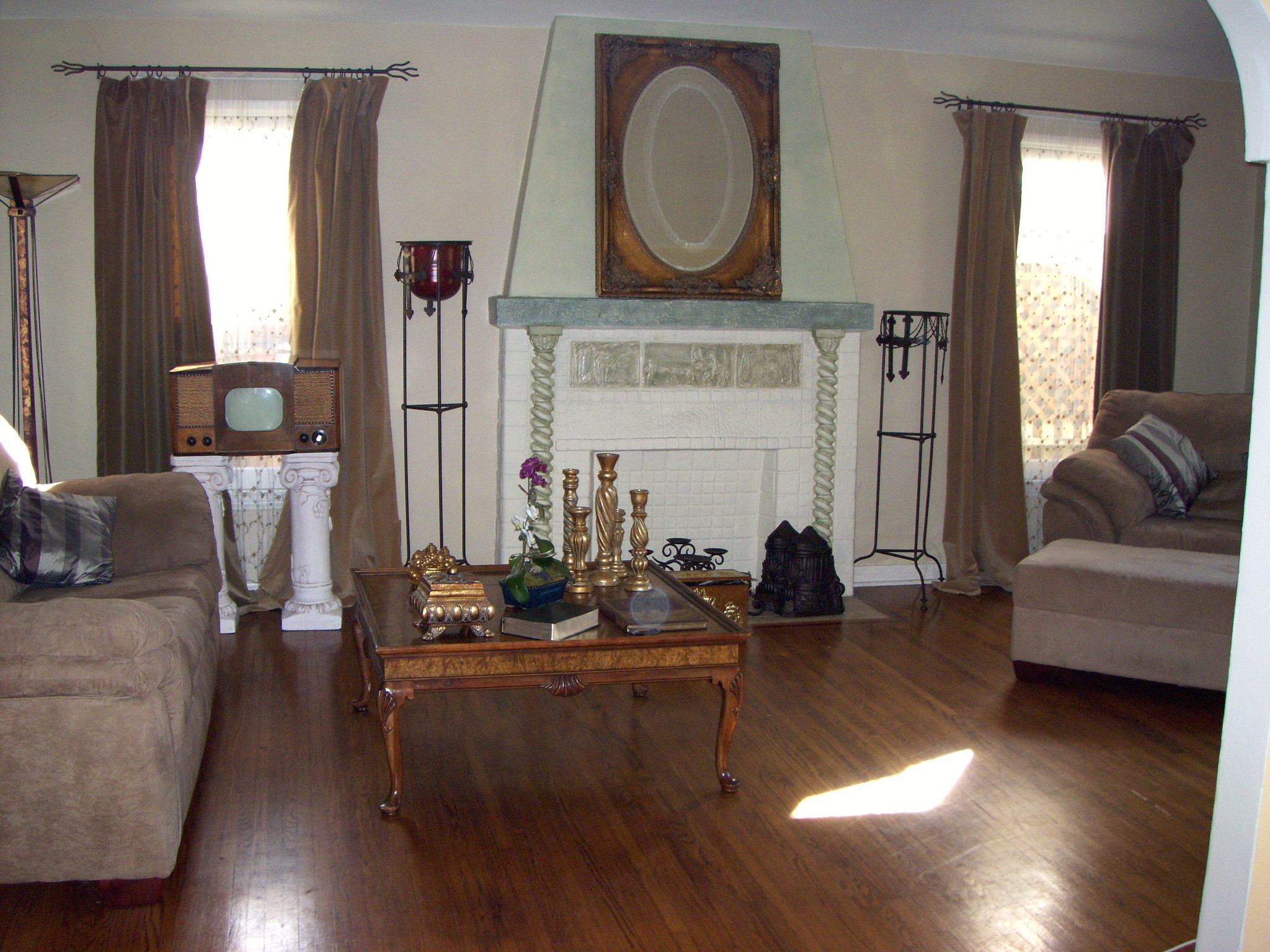 Living room with faux fire place - 1350 S Curson Ave