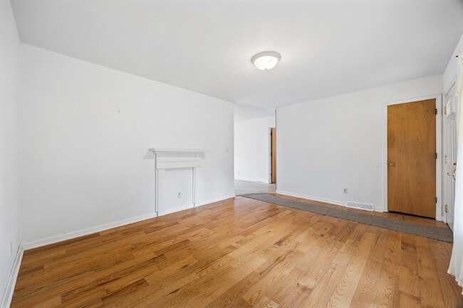 Building Photo - Classic Brick Ranch with 24x24 Workshop, Fenced Yard & Garden Beds