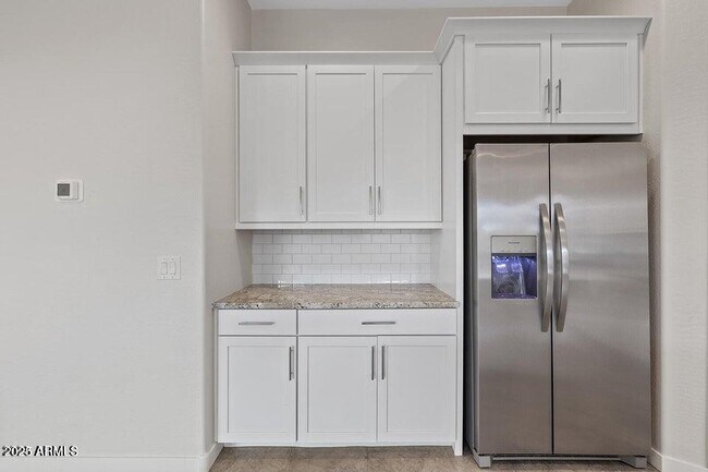 Building Photo - 9749 E Tahoe Ave