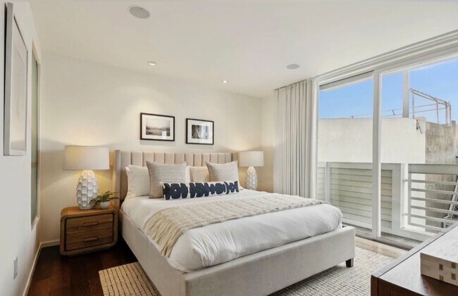 Building Photo - One-of-a-Kind Sophisticated Top-Floor Cond...