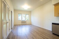 Building Photo - SUMMER SPECIAL: Top Floor Modern 2 Bdr w/ W&D + AC!