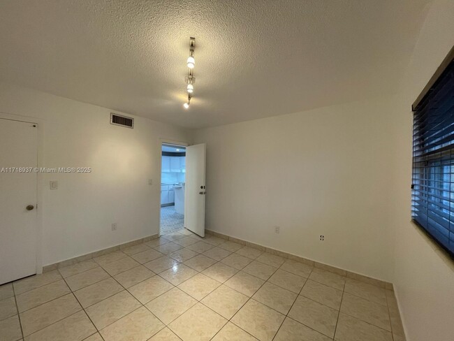 Building Photo - 4275 NW S Tamiami Canal Dr