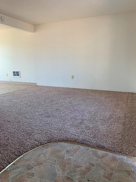 Building Photo - Middle unit in 8-plex complex