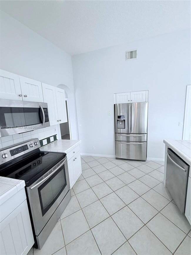 Building Photo - 5089 NW 121st Dr